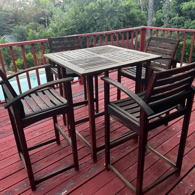 Five-piece outdoor high top seating and table 