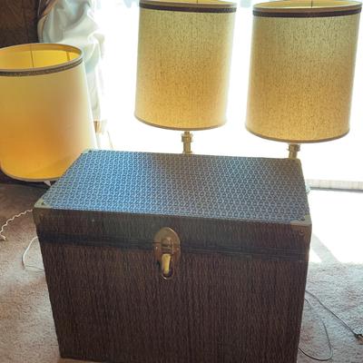 Lamps And Wicker Chest With Linens