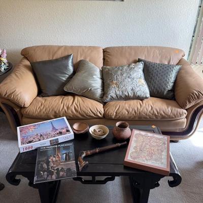 Couch, coffee table, puzzle, book