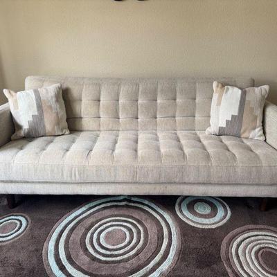 Light Neutral Tufted Sofa w/ Accent Pillows – Mid-Century Style	