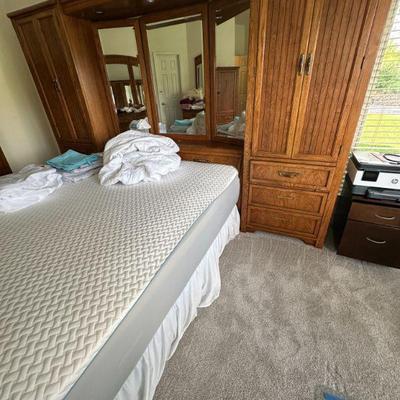 Queen bed with storage headboard