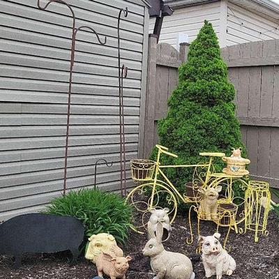 Four shepherds crooks & 11 pieces of yard art