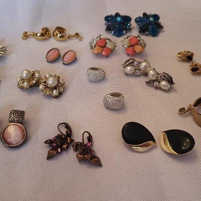 Thirteen pairs clip on earrings