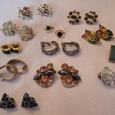 Twelve pairs clip on earrings