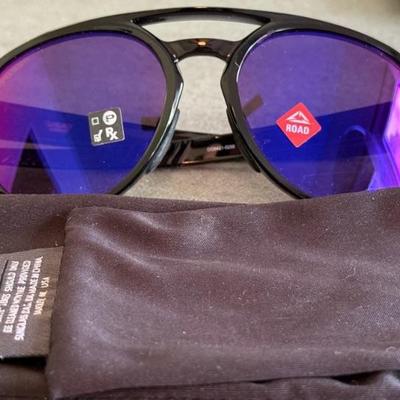 Pair Of Oakley Forager Prism Sunglasses With Oakley Bags