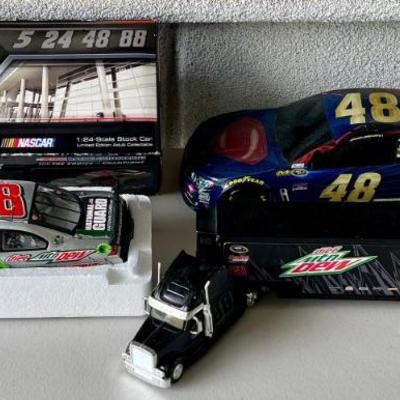 2012 Lionel 1:24 Scale Dale Earnhart Junior Stock Car And Tractor Trailer, And A 2016 Superman Chevy SS