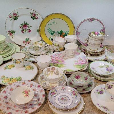 GORGEOUS ASSORTMENT OF FINE BONE CHINA INCLUDING WEDGWOOD, ROYAL DOULTON, AND MORE