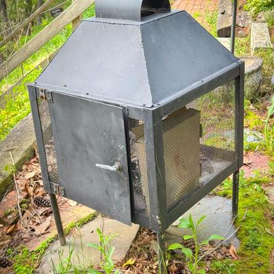 Outdoor Caged Wood Fireplace