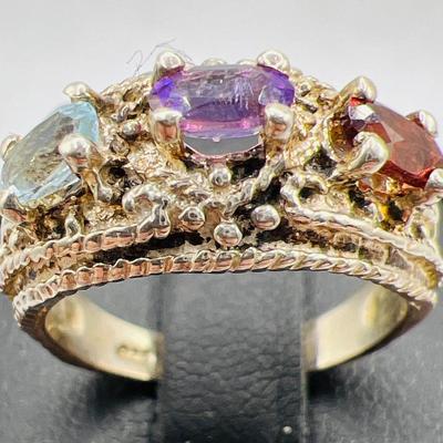 Sterling Silver Ring with Three Sparkling Gemstones
