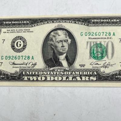 (1) 1976 Crisp Two Dollar Bill found in envelope labeled “First Issue”