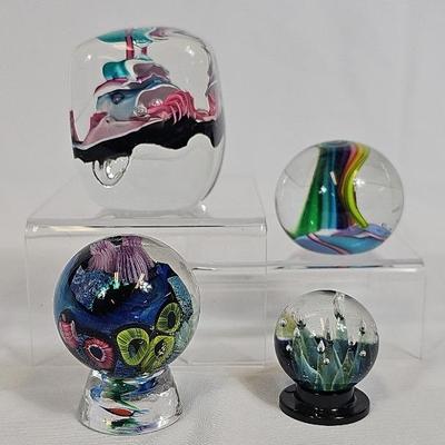 Signed Art Glass Paperweights (2) + Glass Marbles W/Stands (2)