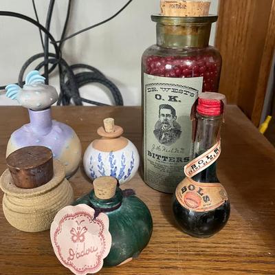 Collection of Decorative Bottles and Dr. West’s O.K. Bitters