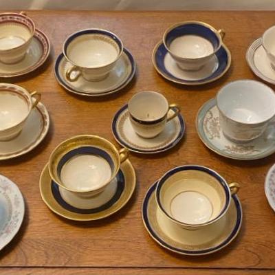 Collection of Mismatched Porcelain Teacups and Saucers