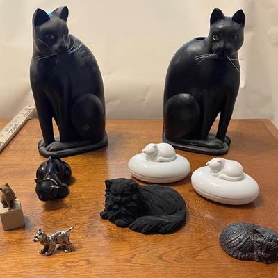 Assorted Cat Figurines in Various Materials