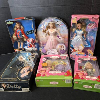 NIB Dolls..Barbie, Strawberry Shortcake, Dolly Parton. 