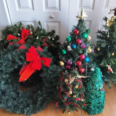 Assortment Of Christmas Winter Decor With 4 Christmas Trees And 3 Holiday Wreaths
