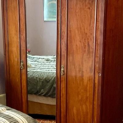 Armoire with mirrored door