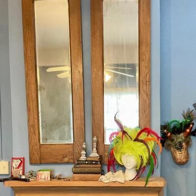 Armoire door mirrors. Costume wig
