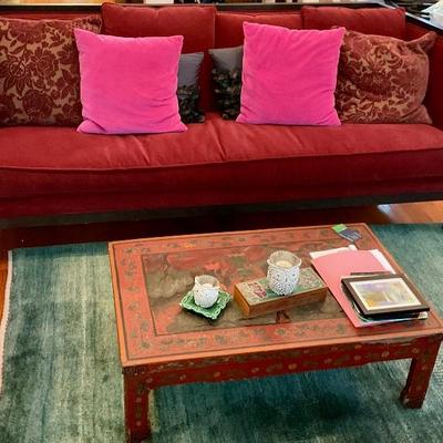 Red sofa and Asian red painted table