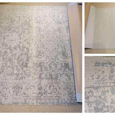 Two Light Gray Rugs by IKEA & Surya