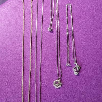 (4) Chains Lot 14k Cross, 2 14k Italy Chains, 1 “S” 14k Italy Chain