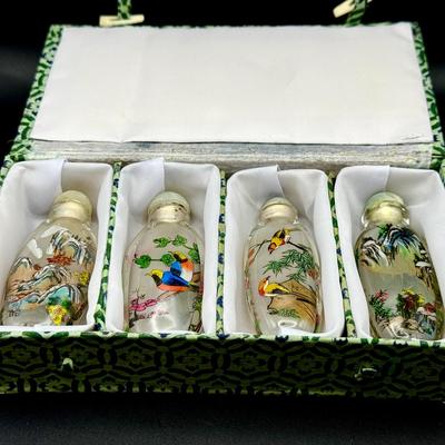 (4) Chinese Reverse Painted Snuff Bottles in Presentation Box