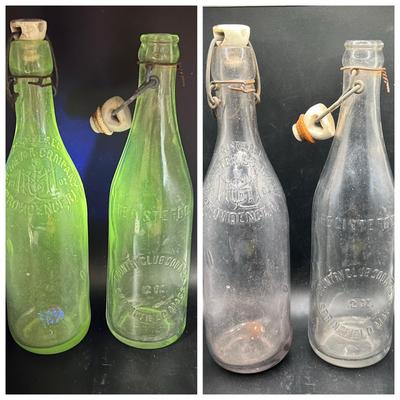 (2) Glass Bottles — Green Glow in Ultraviolet Light