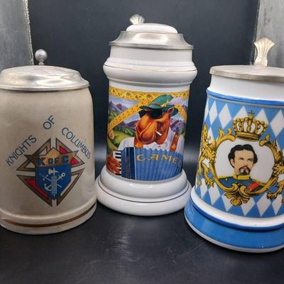 (3) Painted Beer Steins With Metal Lids