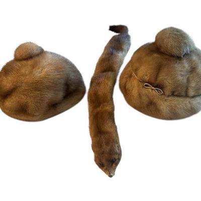 Two mink hats and a scarf