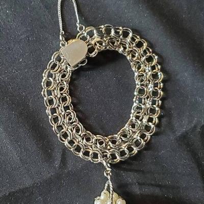 Beautiful Sterling Silver Bracelet With Basket Charm
