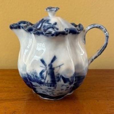 Vintage Blue and White Holland Scene Porcelain Creamer 

Measures 5 inches tall. 
