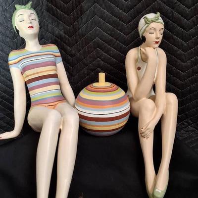 Two vintage bathing beauties in colorful striped swimsuits