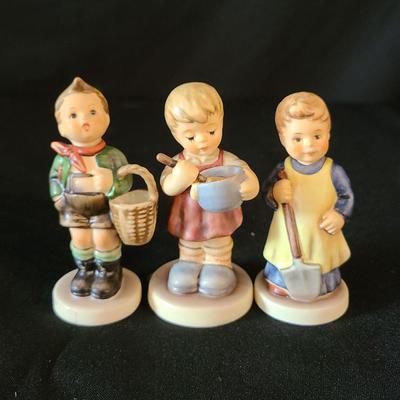 3 Hummel Ceramic Figurines "Village Boy", "Baking Time", "Garden Treasures"