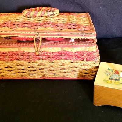 Small Wicker Basket Filled With Sewing Materials And A Swiss Musical Movement Box