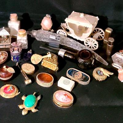 A Plethora Of Perfume Bottles, Vanity Accessories, And More