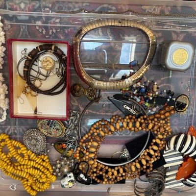 Lots of beaded necklaces, fun earrings, bracelets.