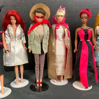 Barbie Fashion Doll Collection in Vibrant Red and Pink Attire