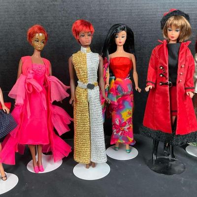 Barbie Fashion Doll Collection in Vibrant Red and Gold Attire