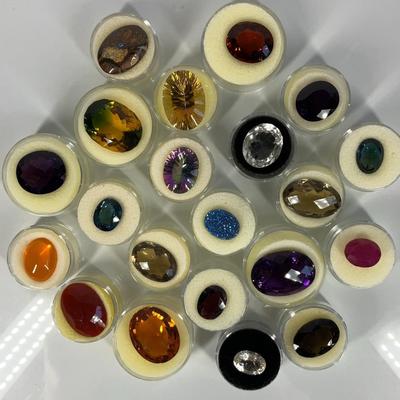 Set of 21 Oval-Cut Gemstones – Labels Potentially Inaccurate