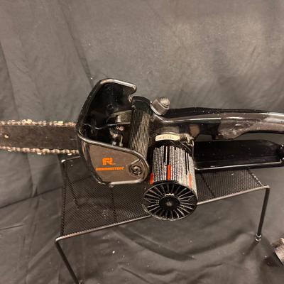 Lot 214: Remington Electric Chainsaw
