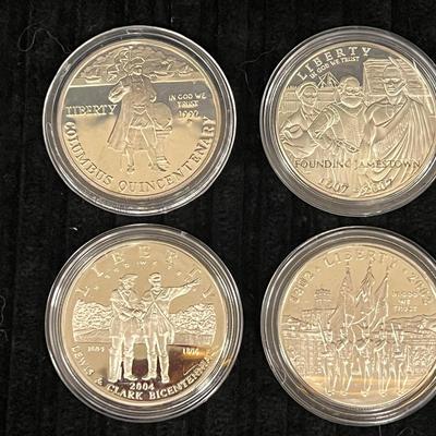 Four Commemorative Liberty Silver Dollars