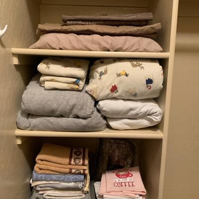 Assorted Linens And Wedge Pillows