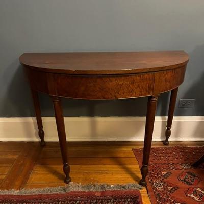 Antique demi lune table