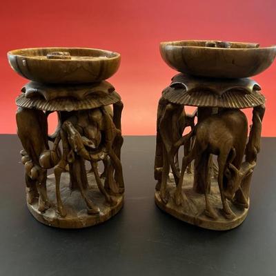 Carved wooden African candleholders