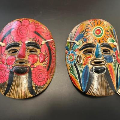 Costa Rican masks and ceramic wall hangings