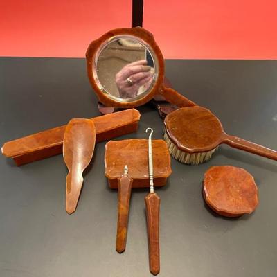 Antique Bakelite dresser set with mirror, brush, shoe horn, button hook and boxes