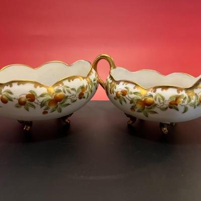 Sale Photo Thumbnail #6: A pair of antique Limoges porcelain cream and sugar, hand painted with fruits