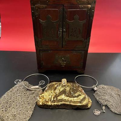Antique Chinese jewelry box with a vintage Whiting and Davis gold mesh purse and two antique sterling silver accordion even bags