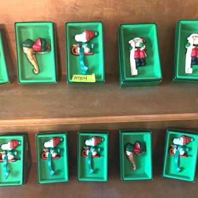 AT514 Hallmark Stocking Holders Including Snoopy