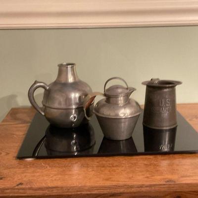(3pc) Pewter Pitchers & Creamer | Vintage (1930''s) set of three (3) pewter pitchers, including a globe pitcher (left), a...